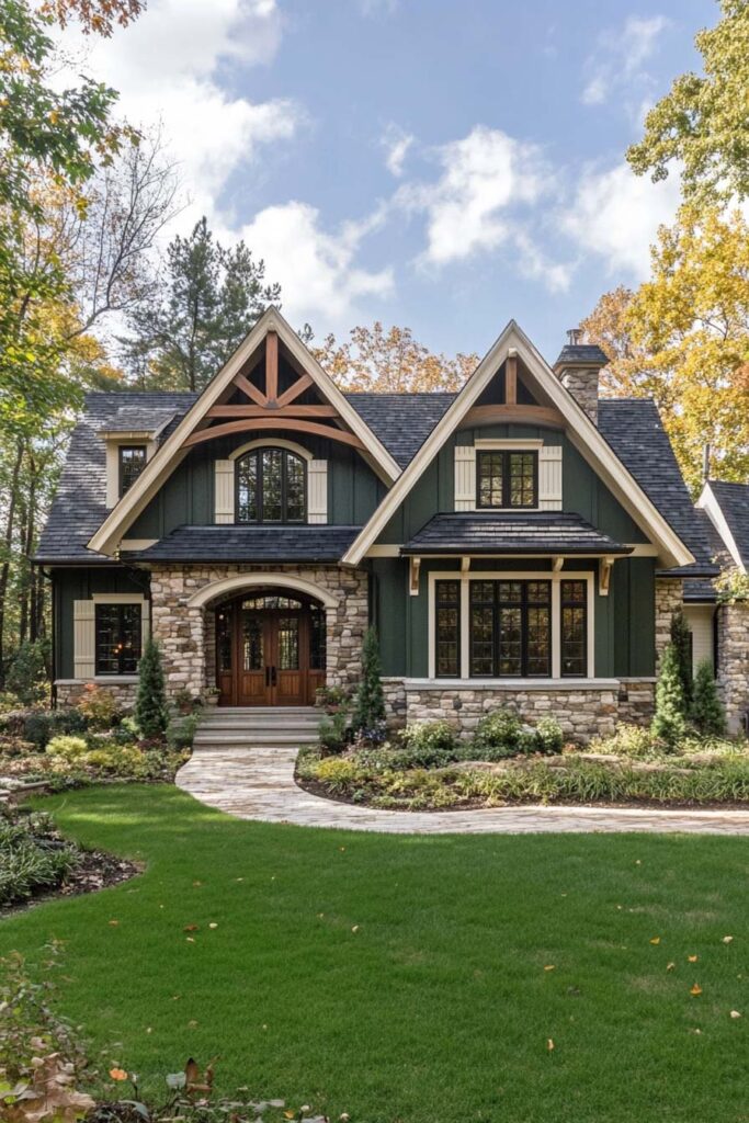 Green craftsman-style house with stone accents, wood details, and gabled roof.