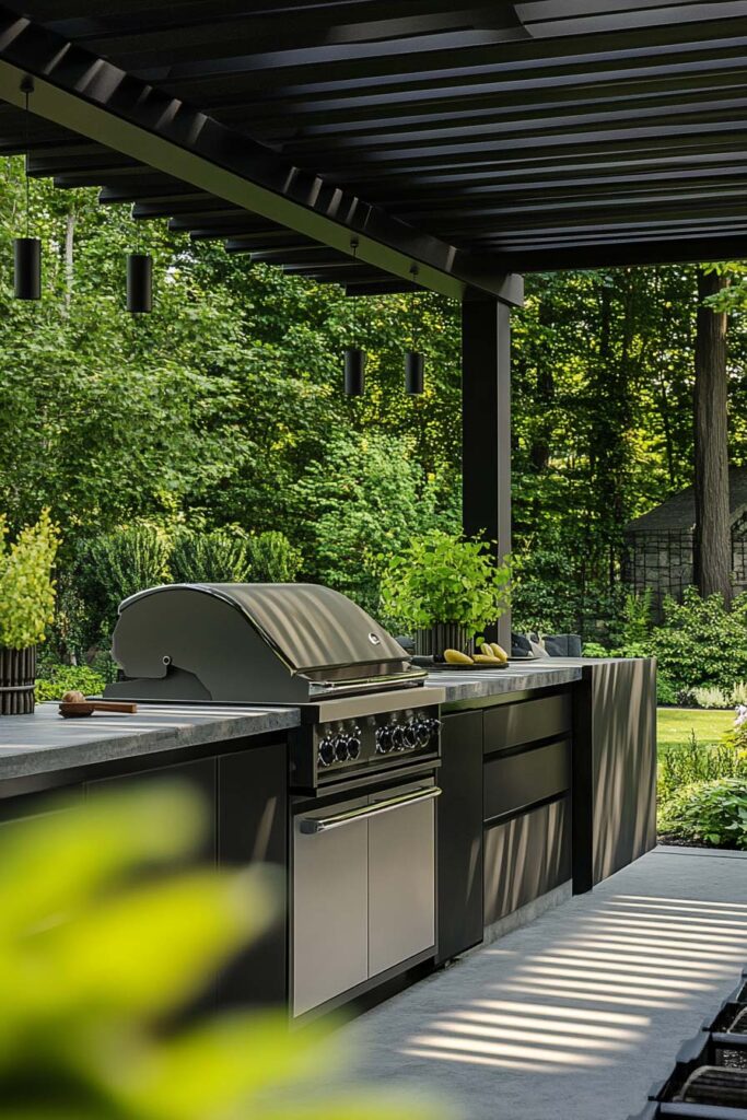 Modern outdoor grill station with black cabinetry, built-in grill, pergola cover, and minimalist backyard design