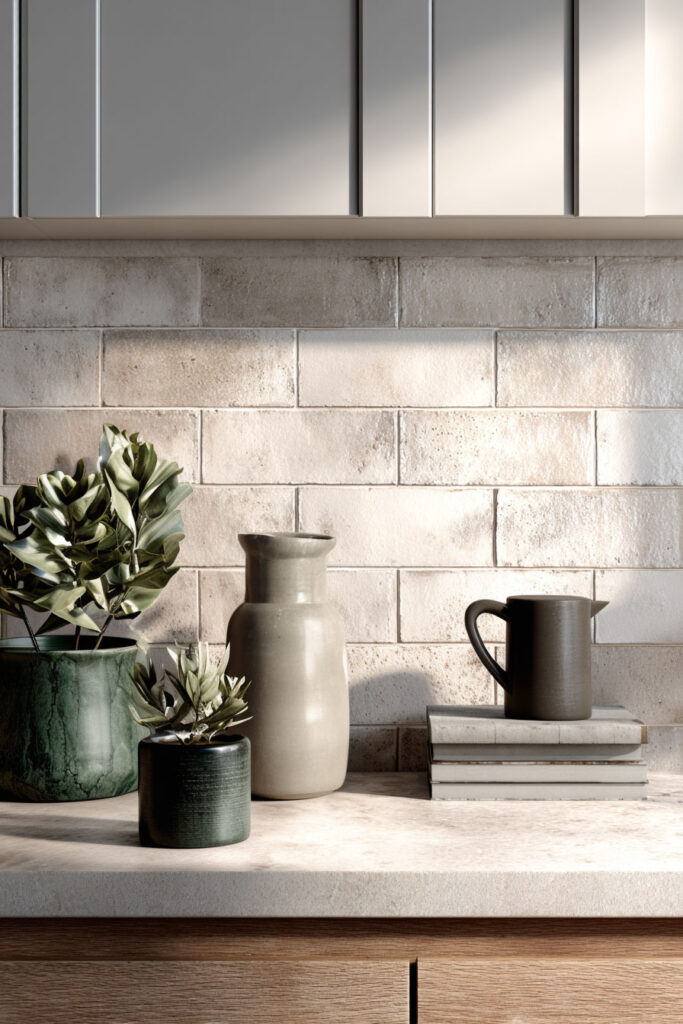 neutral brick style kitchen backsplash with subtle texture, organic modern kitchen with warm tones and minimal styling